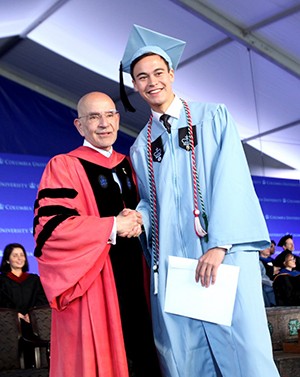 graduate with Dean Peter J. Awn