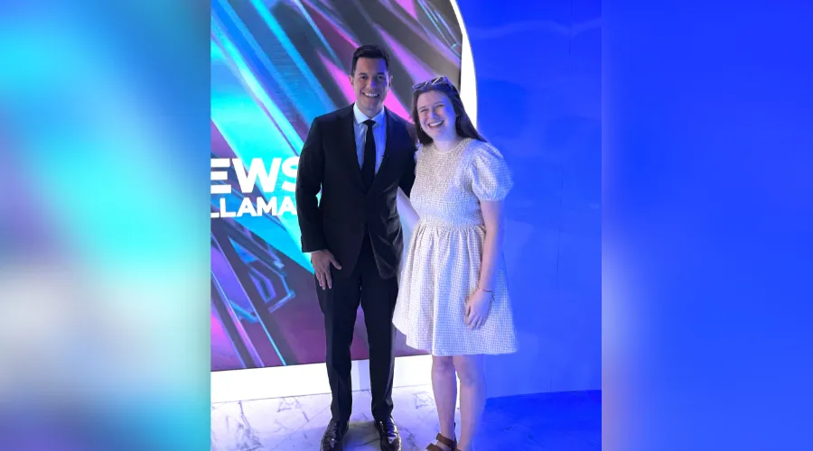 Francesca with news anchor
